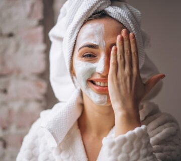 Portrait woman with facial mask half face 1 2000px 360x320